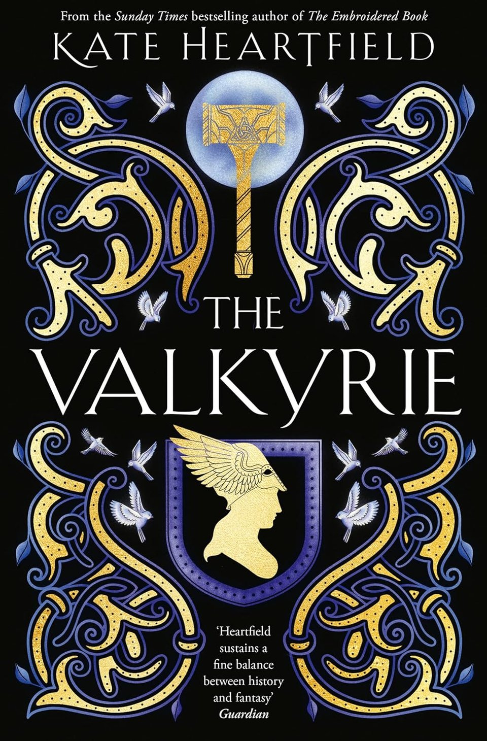The cover of The Valkyrie, designed by Andrew Davis, is black with gold and indigo Norse elements.