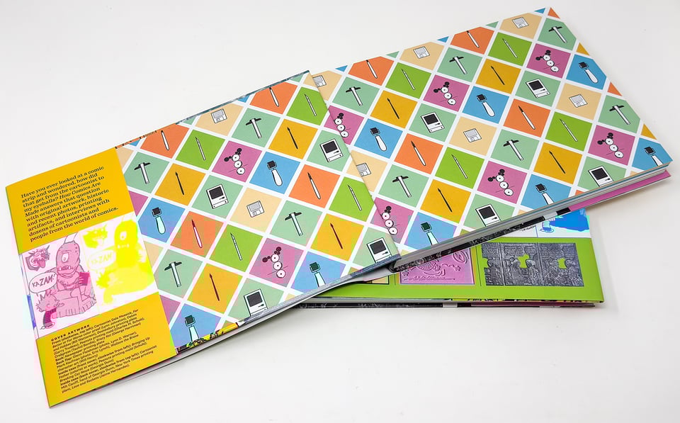Photo of How Comics Are Made open to the endpapers, which are colorful diamonds separated by thin white margins. Each diamond features a flat illustration in black of a drawing or production tool. The book sits on top of another copy whose cover you can see. The flap (at far left) overlaps the endpapers with text on the dust jacket.