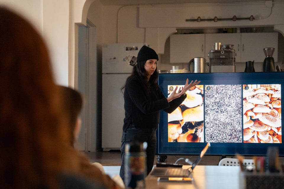 Lexi talking people through growing mushrooms.