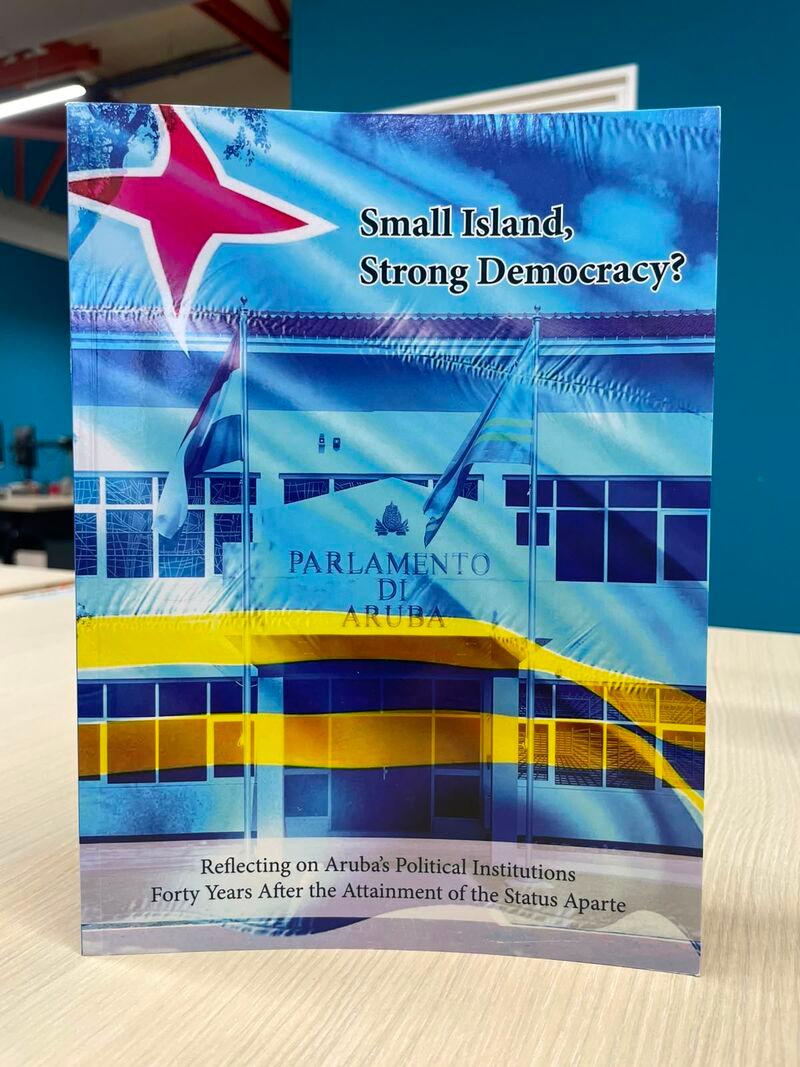 A picture of the book: Small Island, Strong Democracy? Reflecting on ARuba's Political Institutions Forty Years after the attainment of the status aparte.