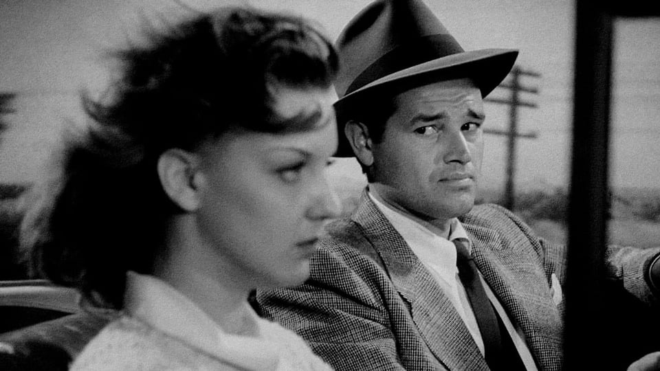 A scene from Detour with Vera Savage and Tom Nail in the car.