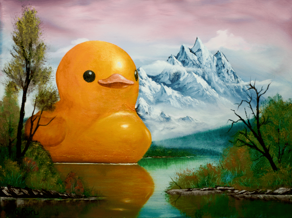 a duck the size of several aircraft carriers enjoys a swim in an alaskan lake