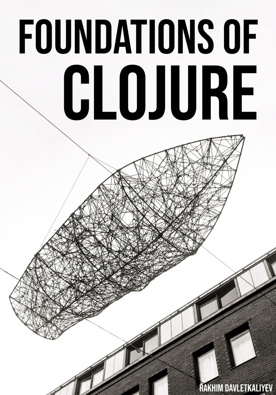 Art installation, shape of a boat made out of thin metallic strings, floating above the street near a building.