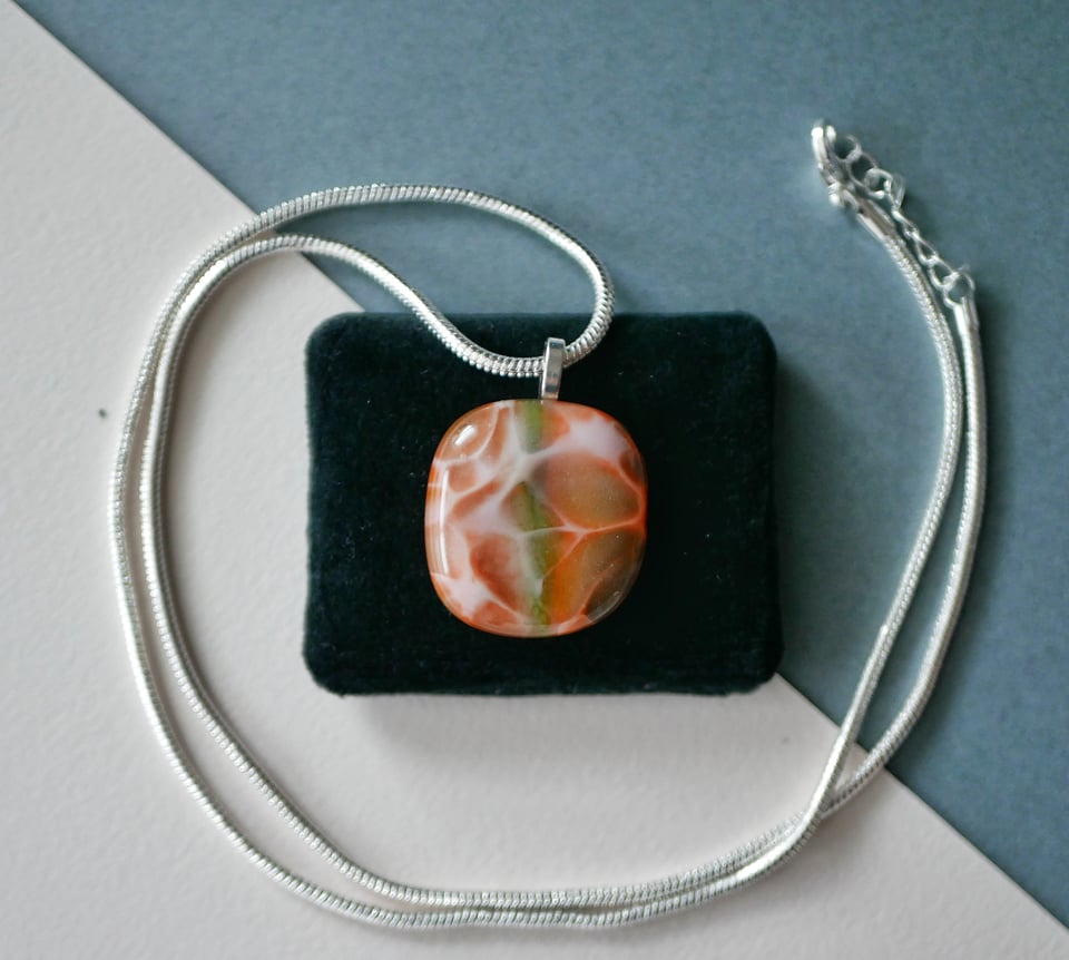 the orange and green cabochons are now pendants