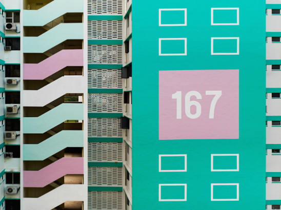 photo of a HDB block of flats with the number painted nearly three storeys high on one wall