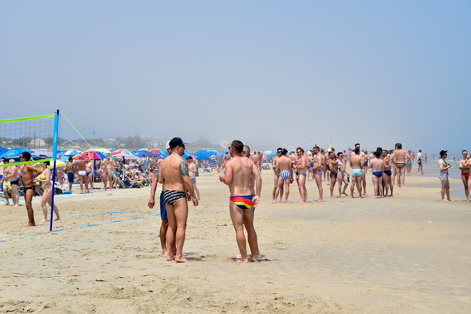 a group of people on a beach