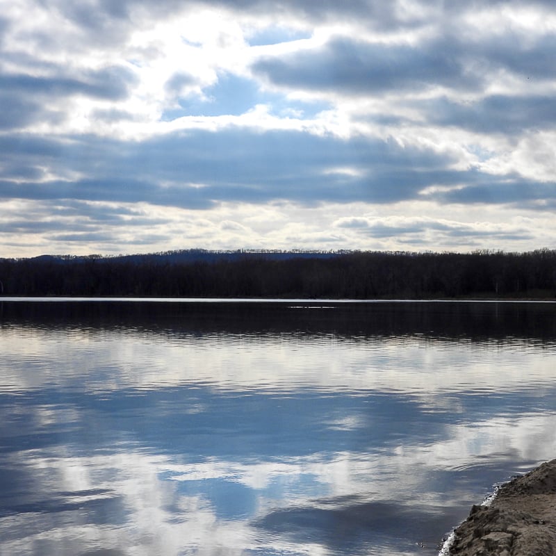 Here’s a screen-cleaner after all those nasty scat photos. Shoreline and sky at Sand Point in late spring. / Photo by Steve Dietz