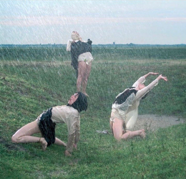 Women screaming in the rain