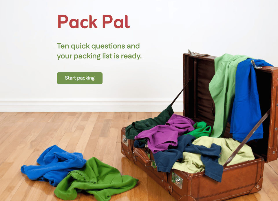 Photo of a open baggage with clothes falling off