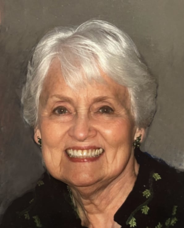 Photo of Shirley Biewen smiling into the camera.