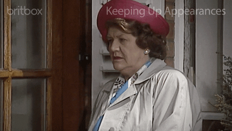 gif of Hyacinth Bucket ear hustling at a door