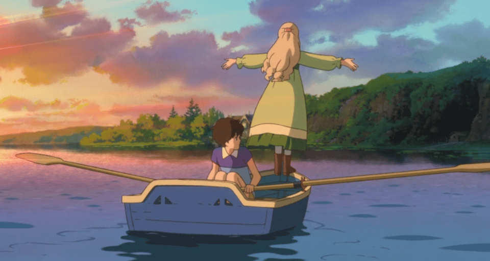 Marnie stands up at the front of the rowboat with her arms out, not unlike in the
