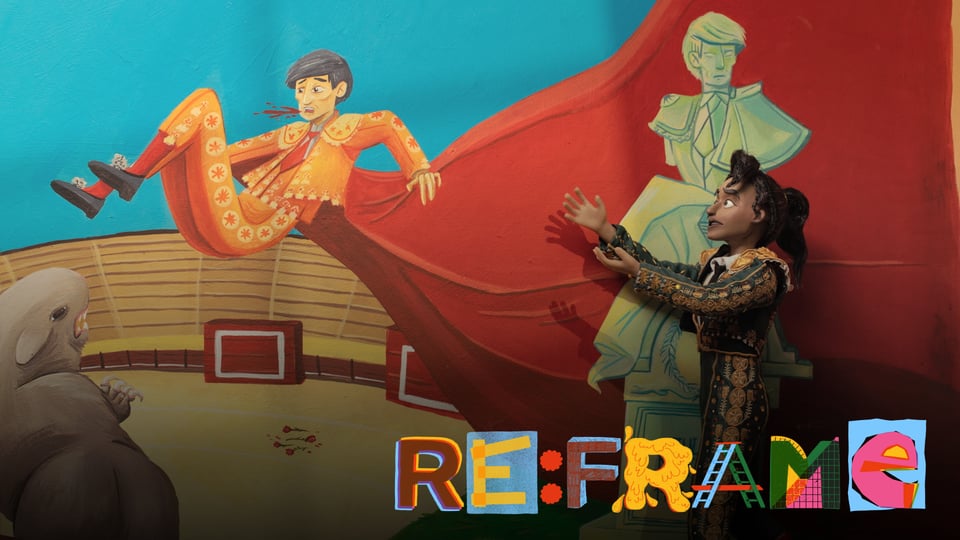 A puppet of a matador gesturaing at a painted mural. The Re:frame logo is in the bottom corner :)