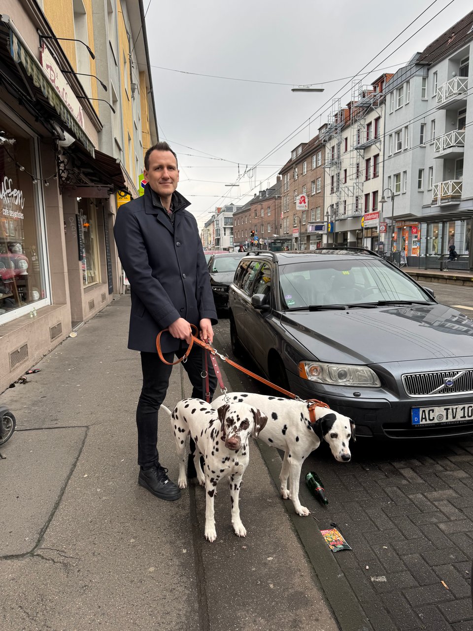 Me in the streets of Cologne with two Dalmatians.