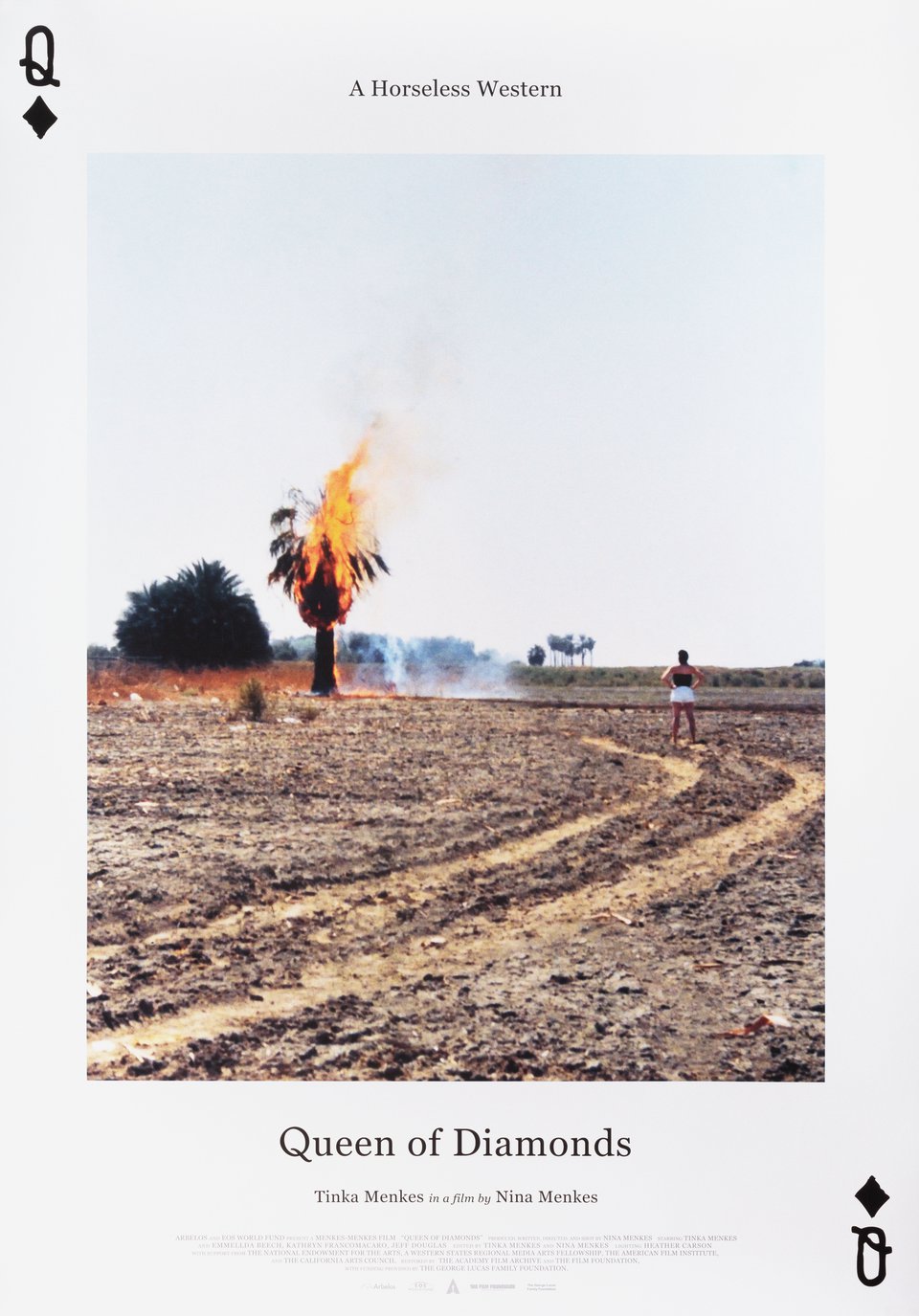 Poster for Queen of Diamonds, which looks like a playing card, except that the Q and diamond icon are black instead of read. Picture is a palm tree on fire, with a woman watching it burn, hands on her hips. tagline at the top reads "A Horseless Western"
Title: Queen of Diamonds
Tinka Menkes in a film by Nina Menkes