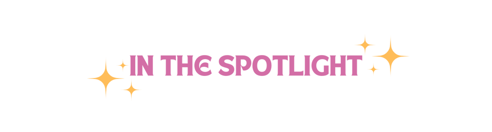 Pink text surrounded by yellow sparkles says "In the Spotlight"