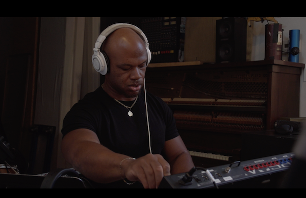 Nick Clark tweaking a sound on the Moog Voyager