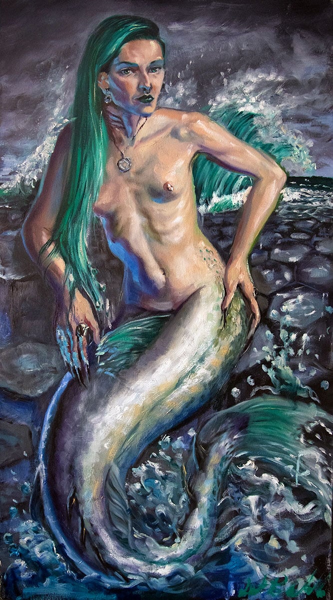 A silvery mermaid with long green hair before a stormy shore