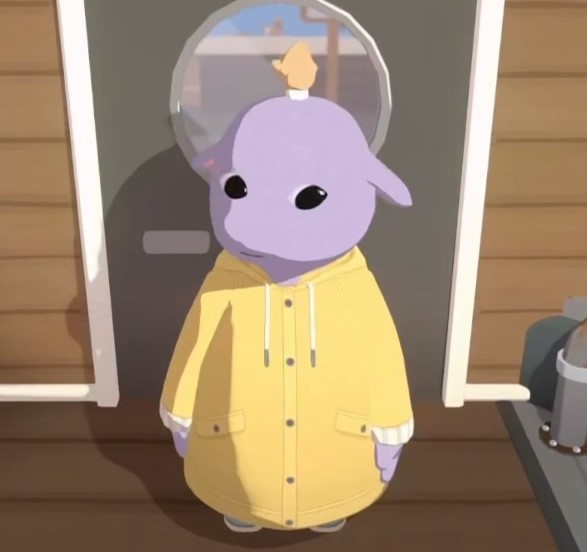 Odd Todd. A humanoid-looking creature with big beady eyes, floppy ears, and a single bundle of hair tied at the very top of his head. He's wearing a yellow coat.