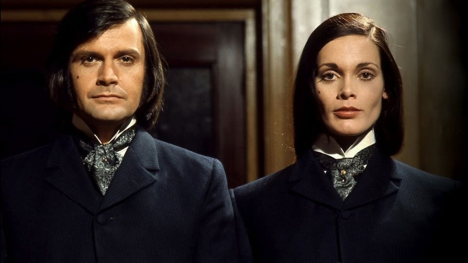 Ralph Bates and Martine Beswick in matching Victorian suits as Dr. Henry Jekyll and his alter ego Edwina Hyde