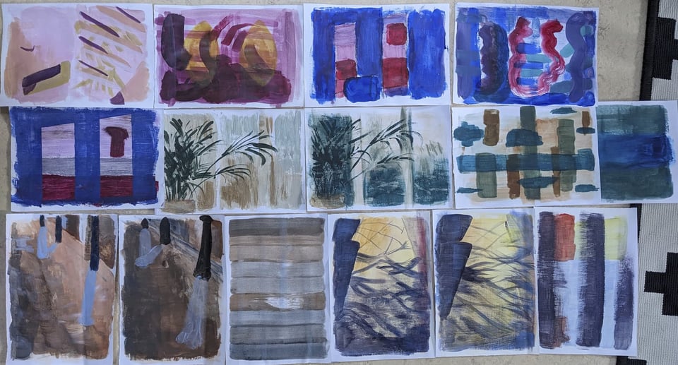 Fifteen first paintings laid out side by side