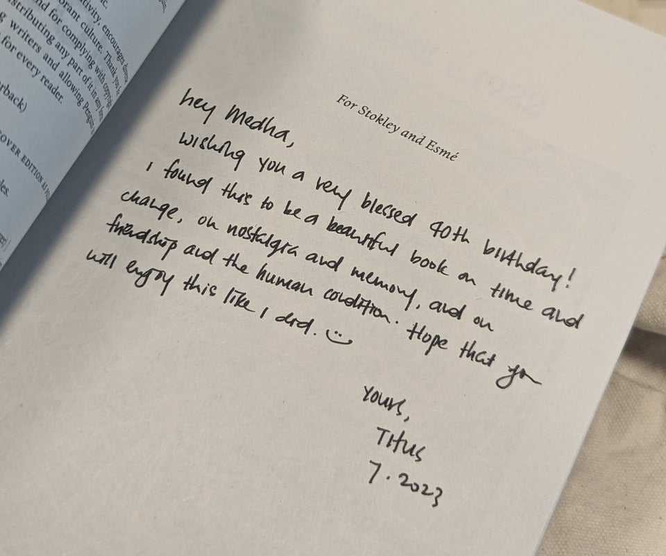 a book with a handwritten note on it