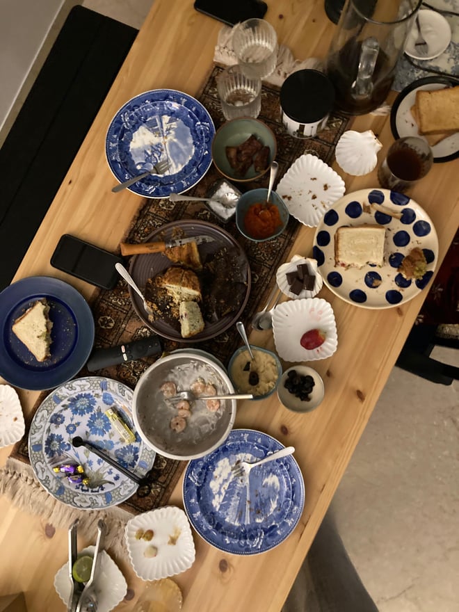 A spread of delicious food laid out on a wooden table