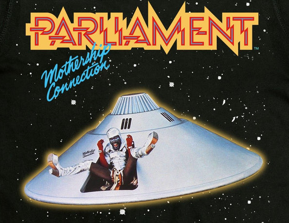 the cover of Mothership Connection by Parliament with George Clinton wearing a glam spacesuit jumping out of a flying saucer