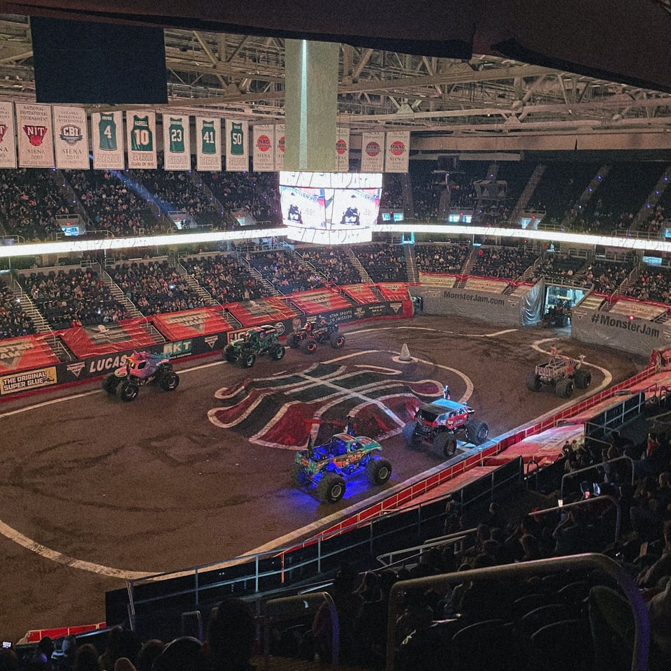 monster trucks gather...ominously? before a Monster Jam at MVP Arena
