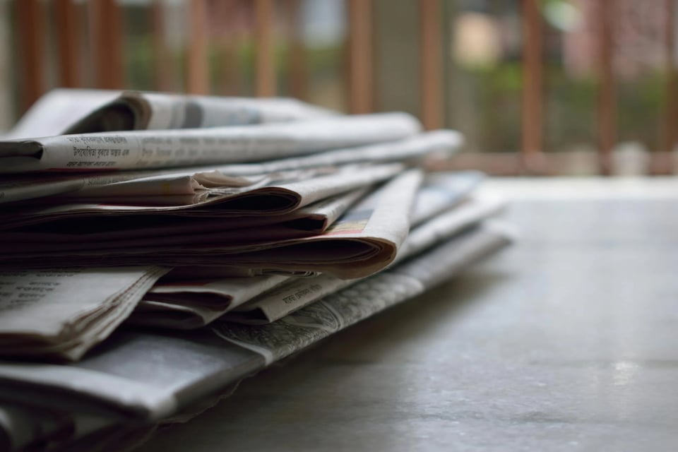 newspapers on a table