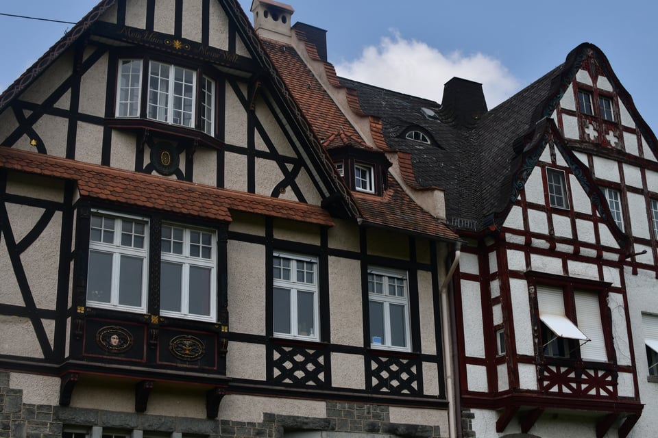 A pair of striking European houses.