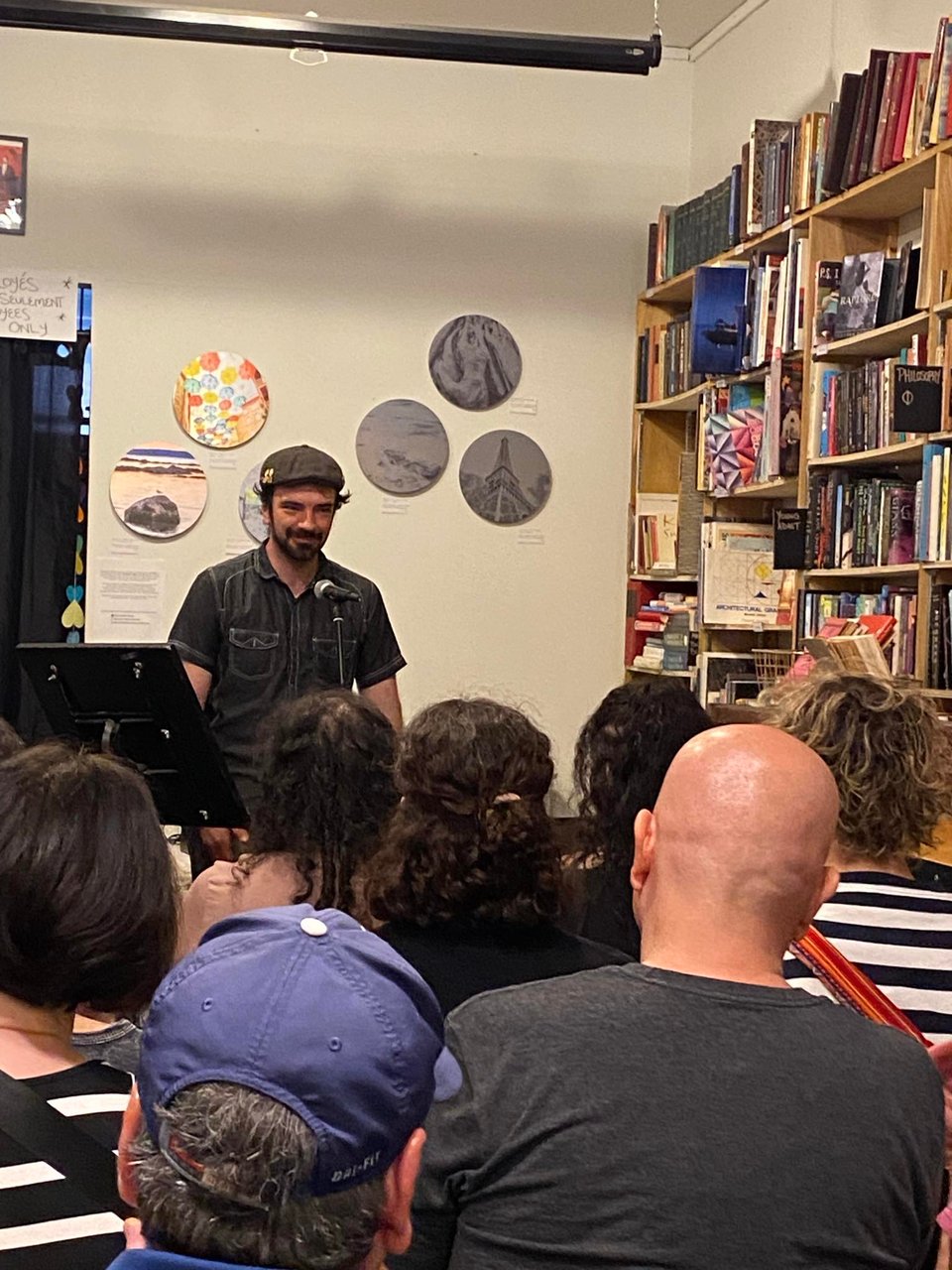 Me standing in front of a small audience at a small bookstore.