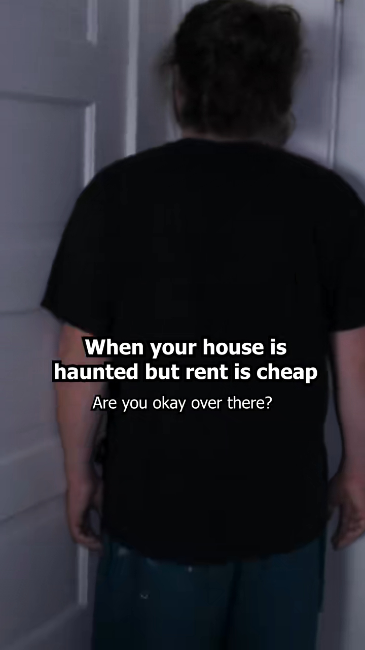 A man stands in a corner with the caption "When your house is haunted but rent is cheap". Someone is asking "Are you okay over there?"