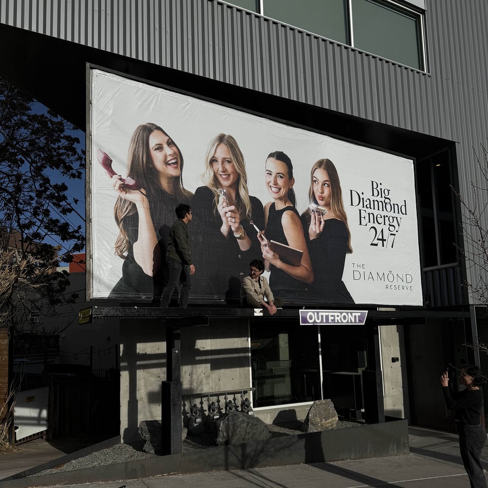 Norton and Ivan hanging out on a billboard.