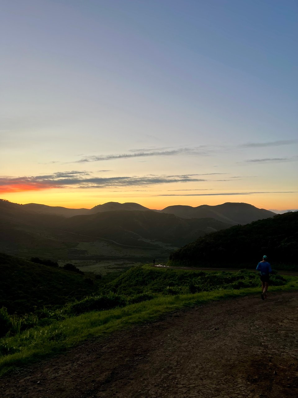 Sunrise over a hilly trail in the Marin headlands