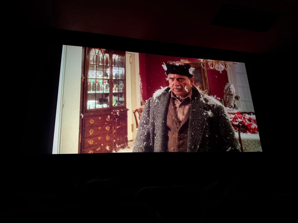 Marv from Home Alone is covered in White Feathers.