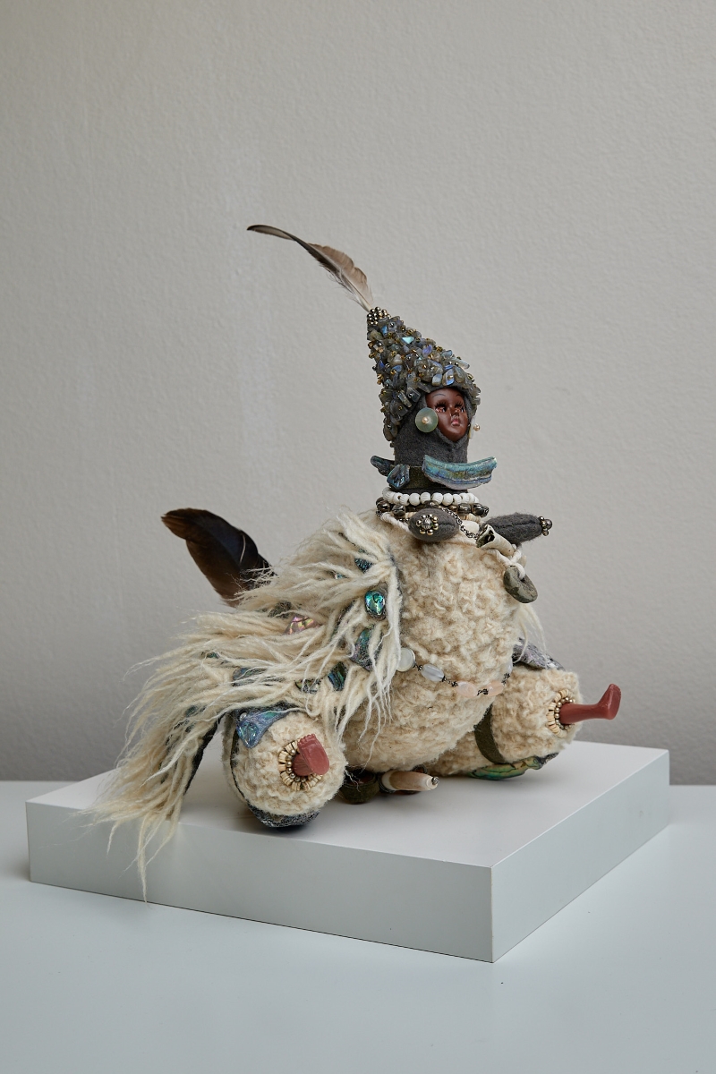 A sculptural creature doll made by Jori Phillips that represents the North Wind, a character from the fairy tale East of the Sun and West of the Moon