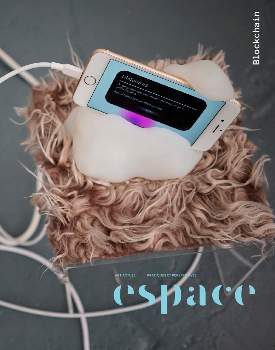 A photo of a Lifeform as laid out for the Espace cover. It is on a rosegold iphone 6, held in a lumpy, organicly-shaped translucent silicone holder