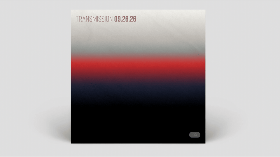 Square cover image for Transmission 09.26.26: a soft horizontal gradient moving from pale grey through a band of red and deep navy into black.