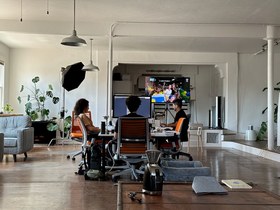 A group of people sitting at desks.