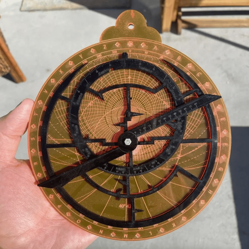 A device that appears at first as a giant compass, but on closer examination has many cryptic symbols.