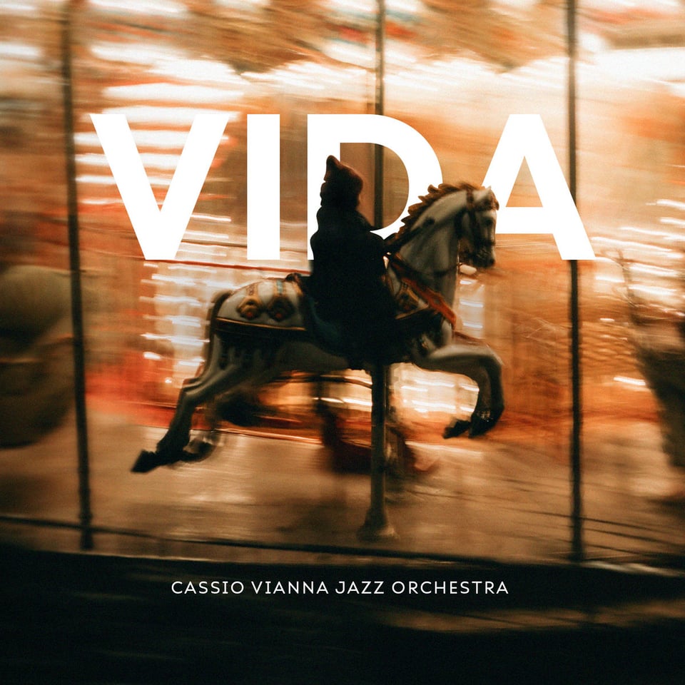 The album cover for Vida, which shows a child on a carousel horse