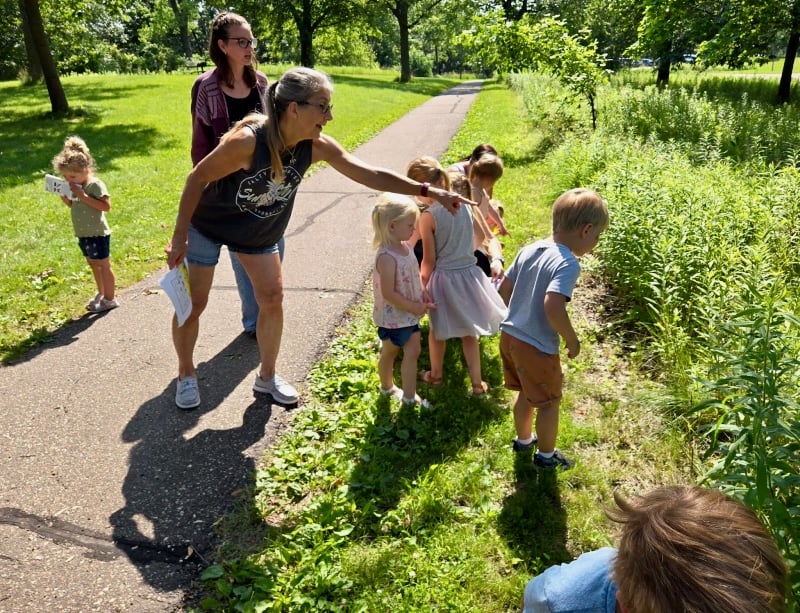 The Nature Explorers insect hunt was quite successful! (Luckily, we had mosquito spray on hand.) Beautiful little dragonflies darted among the prairie plants outside the park’s main picnic shelter, where the class was held. Aug. 13’s topic will be wildlife. (See details below.) / Photo by Pamela Miller