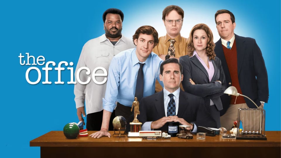 Image of the cast of the television show The Office with white text that says the office.