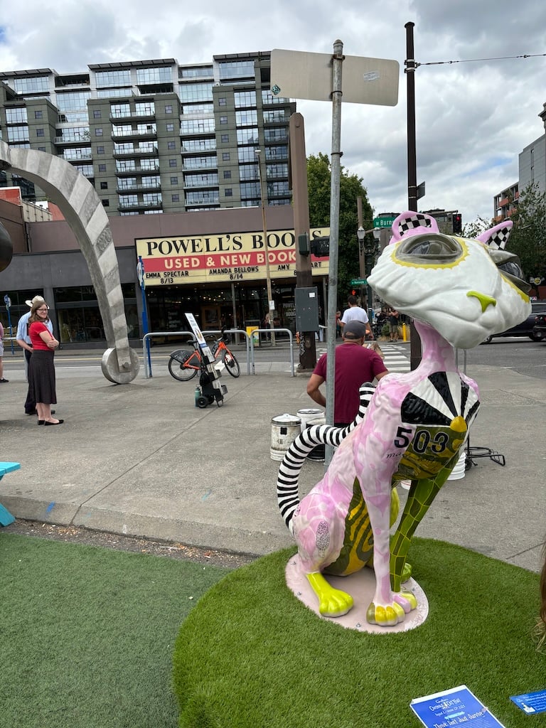 A porcelain (I think) cat statue