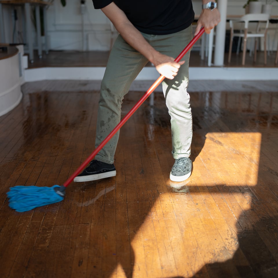 Justin mopping.