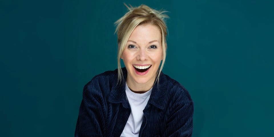 Ali James laughs at the camera.