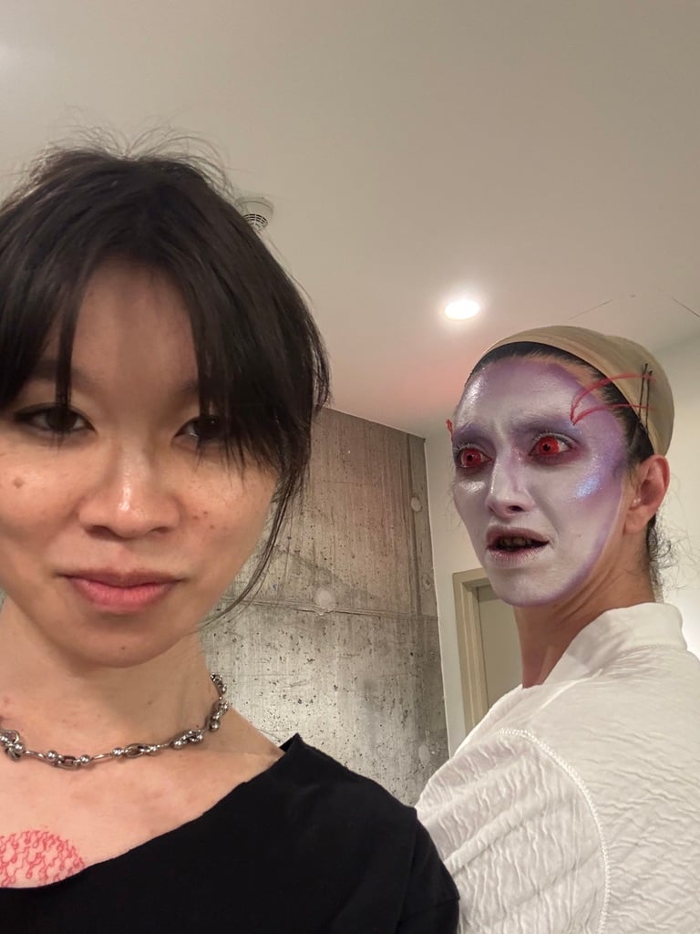 Martine in Marina makeup staring at the back of my head