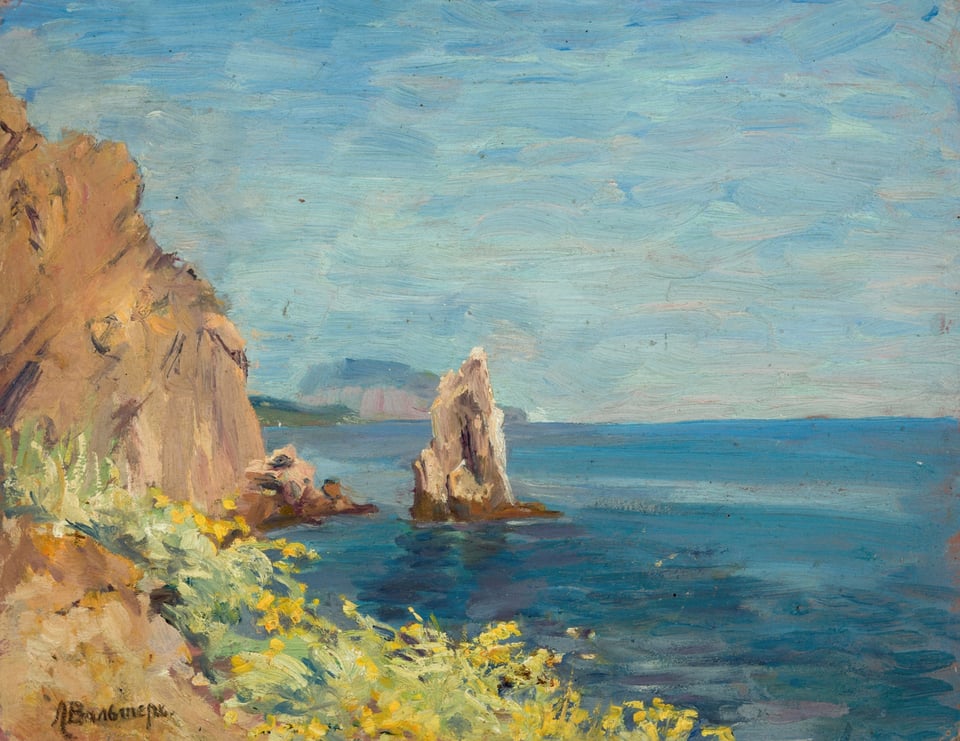 A cliff and a solitary rock bordered by a deep blue sea under a light blue sky