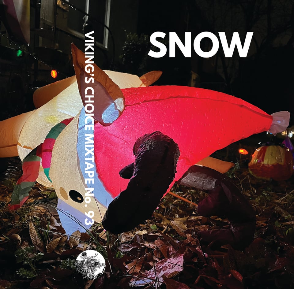 Cassette j-card layout featuring a blow-up reindeer face down in fallen leaves. Mixtape title: SNOW